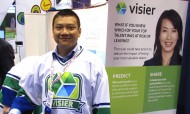 Ryan in front of booth