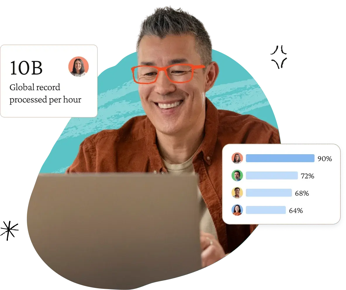 Smiling man in orange glasses at a laptop, with a 10B global records per hour card and a bar chart
